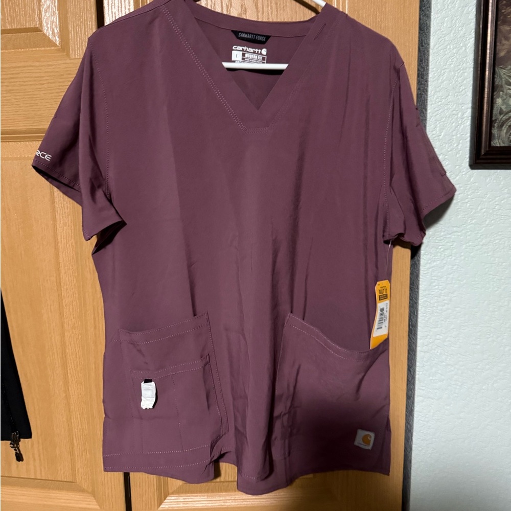 Carhart force.  Brand new. Mauve scrub top  L
